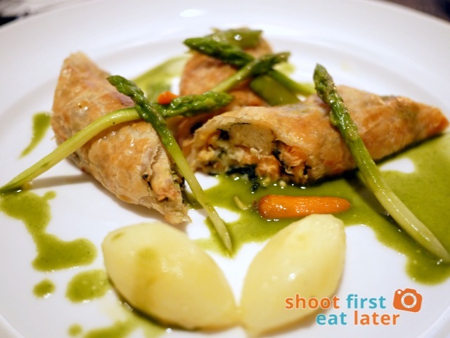 seafood strudel, butter potatoes, herb sauce