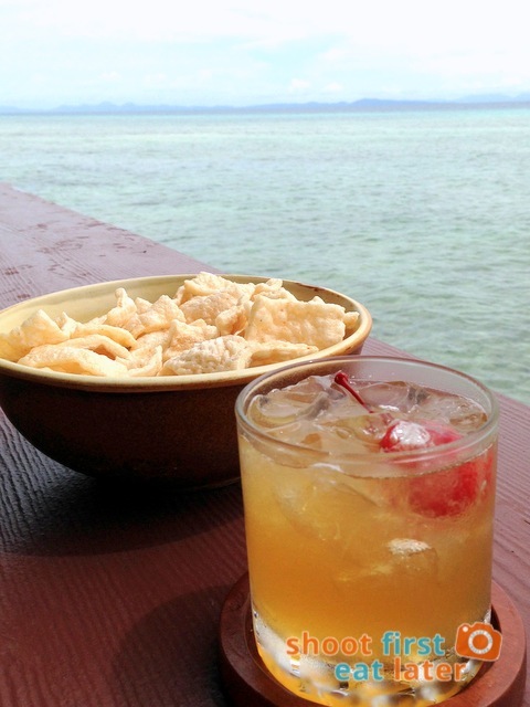 kropek with spicy dilis and peanuts and amaretto sour 