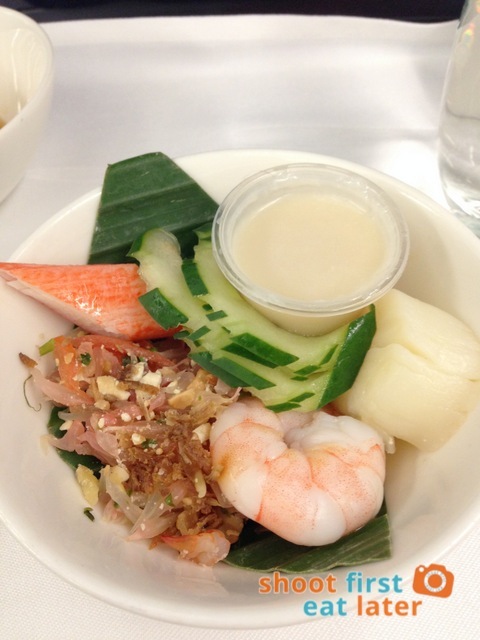 poached prawn, scallops and pomelo salad with coconut dressing