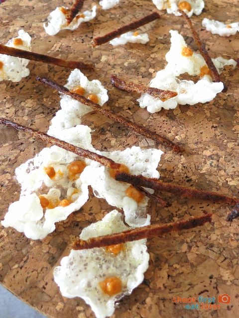 tapioca puffs with sate sauce and rendang flavored chicken skin strips