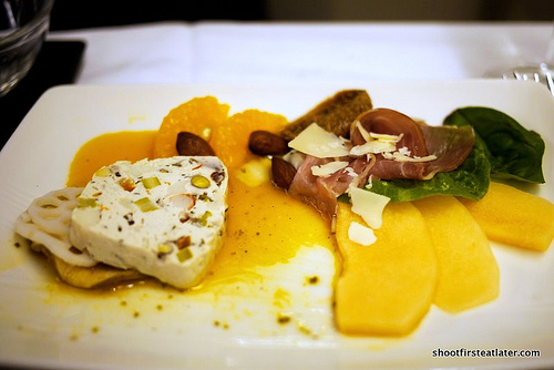 parma ham w/ melon, seafood terrine w: orange dressing